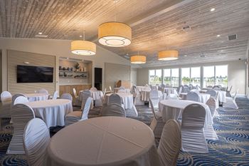A large room with tables and chairs